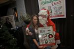 BAARN - In Restaurant Vuur is de perspresentatie gehouden van de nieuwe kerst cd genaamd Christmas Duets.  Met op de foto zangeres Glennis Grace en de Kerstman. FOTO PETER SMULDERS BV