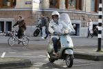 Amsterdam 28 november 2015  
Huub Stapel op zijn vespa scooter
