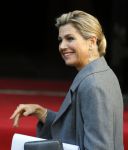 Amsterdam 25 november 2015 
Koninmg Willem Alexander en Koningin Maxima  arriveren bij het paleis op de dam in hun auto (audi A8)