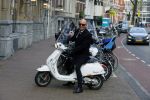 Amsterdam 23 november 2015
Maik de Boer op zijn vespa scooter op straat