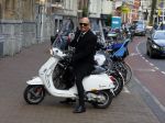 Amsterdam 23 november 2015
Maik de Boer op zijn vespa scooter op straat