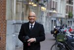 Amsterdam 23 november 2015
Maik de Boer op zijn vespa scooter op straat