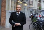 Amsterdam 23 november 2015
Maik de Boer op zijn vespa scooter op straat