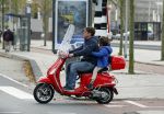 Amsterdam 18 november 2015 
Martijn Krabbe met zijn zoon achilles op vespa scooter