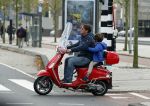 Amsterdam 18 november 2015 
Martijn Krabbe met zijn zoon achilles op vespa scooter