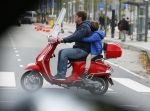 Amsterdam 18 november 2015 
Martijn Krabbe met zijn zoon achilles op vespa scooter