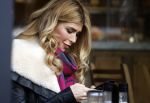Amsterdam 24 november 2016
Esteel Cruijff op terras in amsterdam zuid met kopje koffie en mobieltje