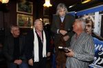 Amsterdam 25 november 2016
Boekpresentatie Johnny Rep bij cafe Scheltema. Johan Derksen reikt eerste exemplaar uit aan Heinz Stuy . Het boek is geschreven door  Mark v d Heuvel.