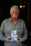Amsterdam 25 november 2016
Boekpresentatie Johnny Rep bij cafe Scheltema. Johan Derksen reikt eerste exemplaar uit aan Heinz Stuy . Het boek is geschreven door  Mark v d Heuvel.