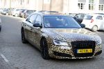 Amnsterdam 24 november 2016
Tony Peroni  jr met zijn audi die gestickerd is met tijgerprint . Tony was bij Buddha to Buddha