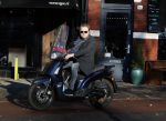 Amsterdam 6 december 2016
Wesley Bronkhorst op zijn scooter op straat in Amsterdam zuid.