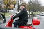 Amsterdam 21 november 2017 
Martijn Krabbe op zijn rode vespa scooter in Amsterdam zuid