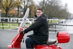 Amsterdam 21 november 2017 
Martijn Krabbe op zijn rode vespa scooter in Amsterdam zuid