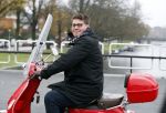 Amsterdam 21 november 2017 
Martijn Krabbe op zijn rode vespa scooter in Amsterdam zuid