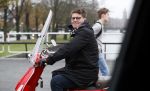 Amsterdam 21 november 2017 
Martijn Krabbe op zijn rode vespa scooter in Amsterdam zuid