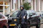 Amsterdam 21 november 2020
Mari v d Ven in regenpak op de fiets