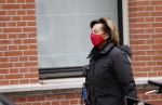 Amsterdam 9 december 2020
Neelie Kroes met mondkapje op straat in Amsterdam zuid