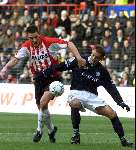 Eindhoven, 9 december 2001
Kompetitie Seizoen 2001/2001
PSV - FC Twente, eindstand 1-0
Spira Grujic en Jan Venngeoor of Hesslink