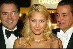 Amsterdam 10 december 2003
Miljonairsbeurs in de RAI Amsterdam. 
Anna Kournikova opent de beurs. Anna en Benno Leeser en direkteur Omega