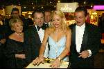 Amsterdam 10 december 2003
Miljonairsbeurs in de RAI Amsterdam. Anna Kournikova opent de beurs. 
Anna en Benno Leeser en direkteur Omega