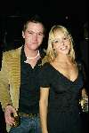 Amsterdam 19 december 2003
Orange Babies feest in Panama te Amsterdam.
Johnny de Mol jr en Chantal Janzenmet een glaasje drank