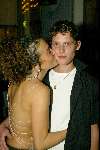 Amsterdam 19 december 2003
Orange Babies feest in Panama te Amsterdam.
 Katja Schuurman en Teun Kuilboer kussend