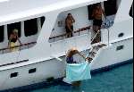 Porto Ercole 6 augustus 2003
Prins Bernhard Maxima Prins Willem Alexander  op de Jumbo VI beide zwemmend