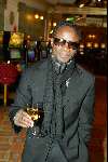Scheveningen 15 december 2003
Brunch in het Holland casino in Scheveningen.
Regilio Tuur met glaasje champagne
