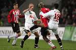Eindhoven, 29 December 2005
Kompetitiewedstrijd seizoen 2005/2006
PSV-FC-Twente eindstand 1-1
Arouna Kone tegen 2 FC-Twente spelers