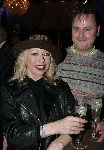 de Kwakel 23 december 2005
Kerstborrel Gerard Joling.
Bonnie st Claire met man hoed en champagne