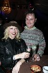 de Kwakel 23 december 2005
Kerstborrel Gerard Joling.
Bonnie st Claire met  hoed en champagne en man