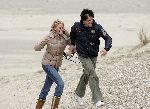 Bloemendaal 3 december 2005
Ellemieke Vermolen met haar nieuwe vriend Jose Fortes Rodriges en hond Bo op het strand.