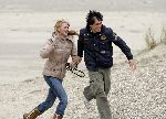 Bloemendaal 3 december 2005
Ellemieke Vermolen met haar nieuwe vriend Jose Fortes Rodriges en hond Bo op het strand.