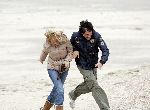 Bloemendaal 3 december 2005
Ellemieke Vermolen met haar nieuwe vriend Jose Fortes Rodriges en hond Bo op het strand.