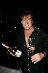 de Kwakel 23 december 2005
Kerstborrel Gerard Joling.
Gerard Met champagne