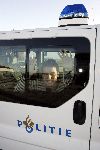 Lelystad14 december 2005
jan Smit in politieauto bij vliegveld Lelystad.