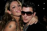 de Kwakel 23 december 2005
Kerstborrel Gerard Joling.
Jan Smit met kelly BB met tatoeage