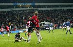 Eindhoven, 17 December 2005 Kompetitiewedstrijd PSV-Willem II ,  eindstand 4-1
Mika Varynen scoort zijn eerste officiele doelpunt in dienst van PSV. Hij wordt gefeliciteerd door Jefferson Farfan en Timmy Simons links de verslagen doelman van Willem II Peter Zois
@Foto: Junior Smulders