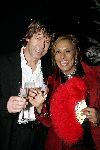 de Kwakel 23 december 2005
Kerstborrel Gerard Joling.
Patty Brard met champagne en vriend