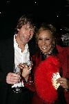 de Kwakel 23 december 2005
Kerstborrel Gerard Joling.
Patty Brard met champagne en vriend