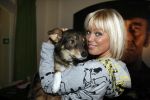 Amsterdam 31 januari 2007
Bridget Maasland met haar hond  Tibbs bij presentatie hondenpenning tegen dier proeven.