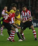 Eindhoven, 20 Februari 2007 Champions Leaguewedstrijd
PSV-FC Arsenal 1e ronde Eindstand 1-0 Seizoen 2006/2007
Diego Tardeli in duel met Tomas Rosicky en Phillip Cocu