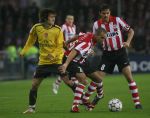 Eindhoven, 20 Februari 2007 Champions Leaguewedstrijd
PSV-FC Arsenal 1e ronde Eindstand 1-0 Seizoen 2006/2007
Diego Tardeli in duel met Tomas Rosicky en Phillip Cocu