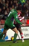 Eindhoven, 24 Februari 2007 Kompetitiewedstrijd PSV-FC Groningen, eindstand 1-0 Seizoen 2006/2007
Jefferson Farfan in duel met Antoine v d Linden