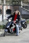 Amsterdam 31 januari 2007
Menno Kohler met hond op vespa scooter bij presentatie hondenpenning tegen dier proeven.