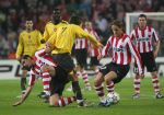 Eindhoven, 20 Februari 2007 Champions Leaguewedstrijd
PSV-FC Arsenal 1e ronde Eindstand 1-0 Seizoen 2006/2007
Phillip Cocu in duel met Tomas Rosicky en Mika Vayrynen