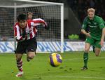 Eindhoven, 24 Februari 2007 Kompetitiewedstrijd PSV-FC Groningen, eindstand 1-0 Seizoen 2006/2007
Sun Xiang wordt achtervolgd door Martijn Meerdink