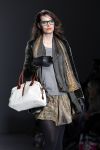 Amsterdam 28 januari 2012
modeshow Custo op de IAFW met oa aanwezig Martijn en Amanda Krabbe met hun dochters.
Peter Smulders bv