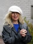 Aalsmeer 17 januari 2014
Bonnie st Claire met haar hondjes bij haar huis.