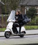 Amsterdam 9 januari 2013
Holly Brood met (een) vriend op vespa scooter.